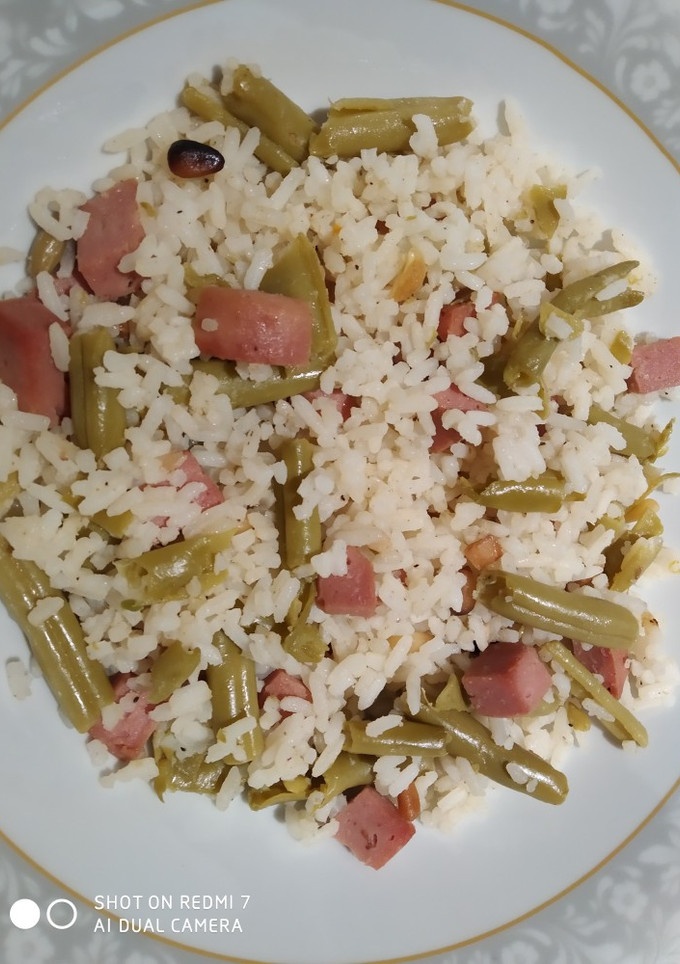 Una foto de Arroz con judías y piñones