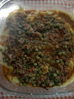 Una foto de Polenta con carne molida