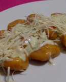Ñoquis de calabaza con crema de ciboulette y hierbas