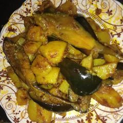 A picture of Potato and eggplant vegetable.