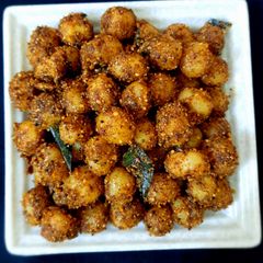 A picture of Chettinad style baby potato roast (no onion no garlic).