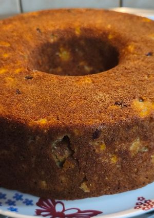 Una foto de Budín húmedo de pera y mandarinas