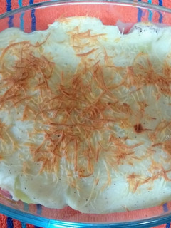 Una foto de Patatas con jamón y queso gratinadas
