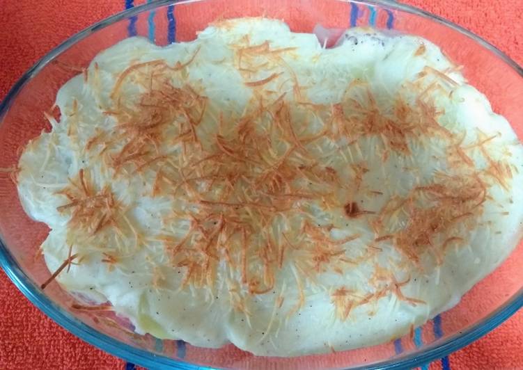 Patatas con jamón y queso gratinadas
