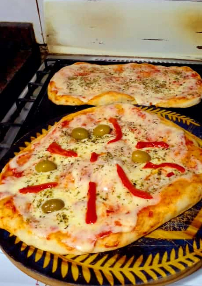 Una foto de Masa para pizzas caseras exquisitas!