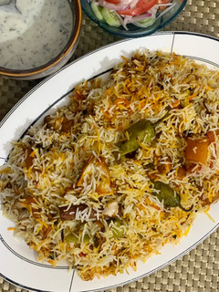 A picture of Chicken malai biryani.