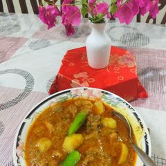 A picture of Tinday gosht (apple gourd with mutton).