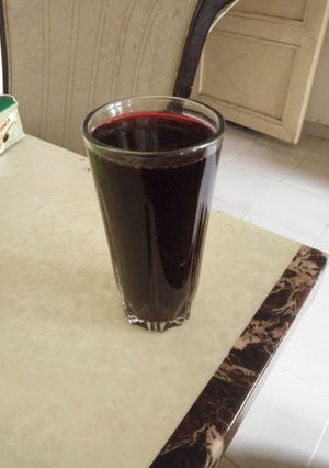 A picture of Mint leaf and hibiscus drink.