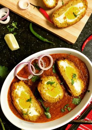 A picture of Veg. Nargisi Kofta in Tomato Gravy.