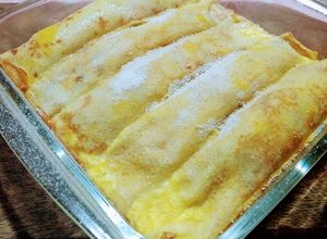 Una foto de Crepes de ricota, con pasas de uva y nueces