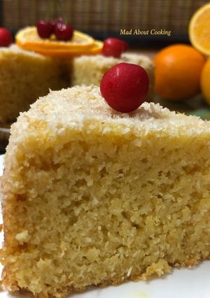 A picture of Eggless Coconut Orange Cake.