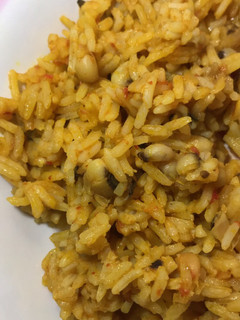 A picture of Jollof rice and beans.