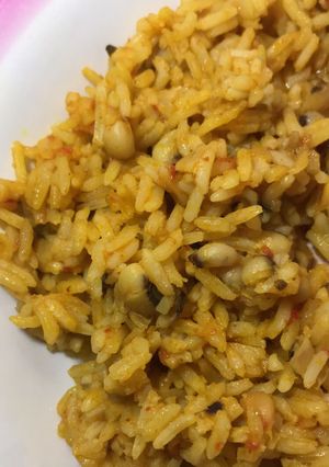A picture of Jollof rice and beans.