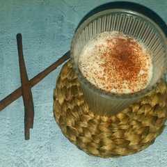 A picture of Cappucino with cinnamon.