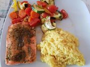 A picture of fish with vegetables