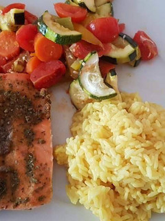 A picture of Salmon with Vegetables in the Oven.