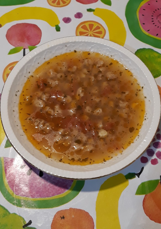 Una foto de Sopa depurativa con sofrito de tomate, ajos y soja texturizada