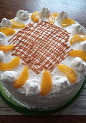Una foto de Torta de durazno y manjar