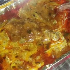 A picture of Aloo tikki chole.