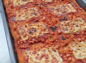 Una foto de Pizza a la italiana🍕Pizza Familiar🍕