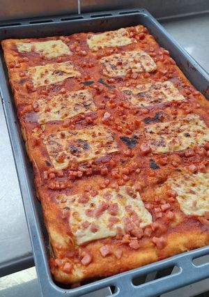 Una foto de Pizza a la italiana🍕Pizza Familiar🍕