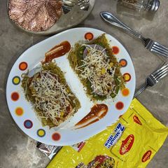 A picture of Open Grilled Paneer and Cheesy Corn Maggi Sandwich.