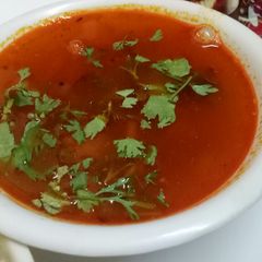 A picture of Tomato rassam.