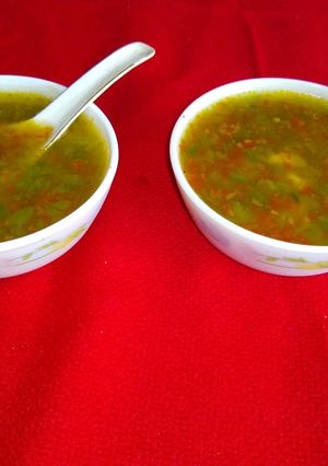 A picture of Corn and vegetable soup.