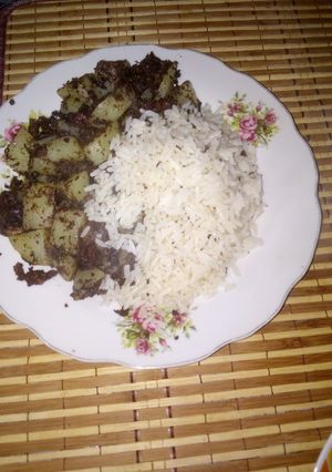 Una foto de Arroz con morcilla