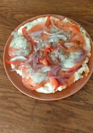 Una foto de Pizza de pollo