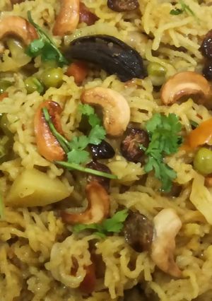 A picture of Cook with dry fruits vegetables tehiri.