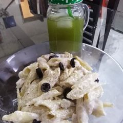 A picture of Chicken pasta with mint margarita.