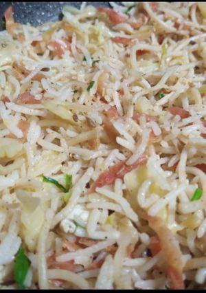 A picture of Fried rice with Pasta.