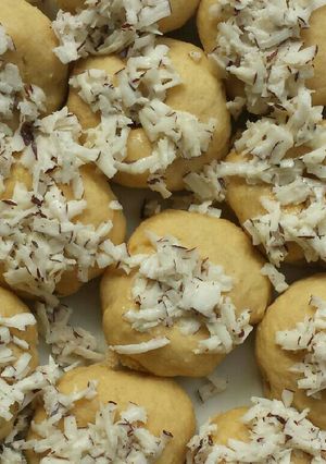 A picture of Baked dougnut with coconut iced.