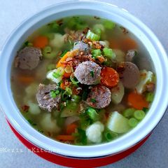 A picture of Vegetables and Meatball Soup.