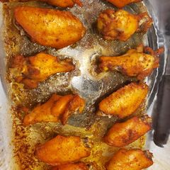 A picture of Oven baked chicken wings.