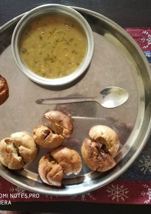 A picture of Daal Baati and Lehsun chutney.