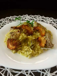 Una foto de Risotto de conejo y alcachofas