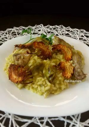 Una foto de Risotto de conejo y alcachofas