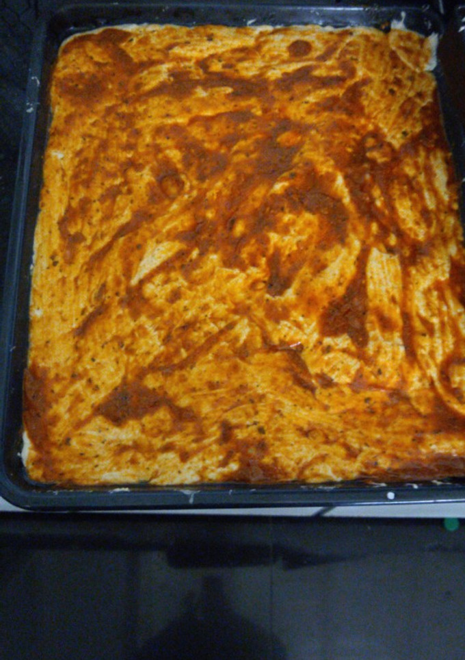 Una foto de Masa de pizza casera de harina con levadura