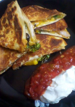 A picture of shrimp and vegetable quesadilla.
