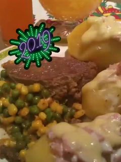 Una foto de Papas rellenas con crema, jamón y queso
