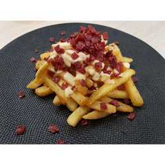 A picture of French Fries with Cheese Sauce.