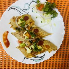 A picture of Cheese Veggie Frankie in dinner.