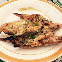 A picture of Grilled shrimp on a garlic Sautée.