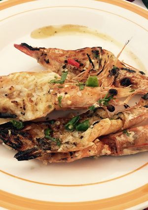 A picture of Grilled shrimp on a garlic Sautée.