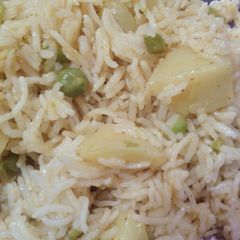A picture of Aalu matar rice.