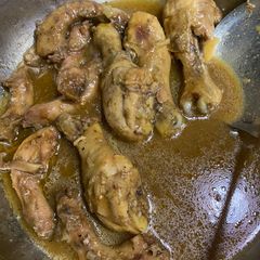 A picture of Chicken necks and drumsticks.