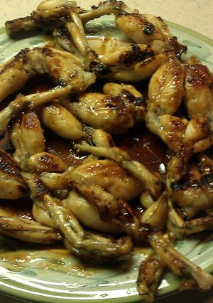 A picture of Carmelized frog legs.