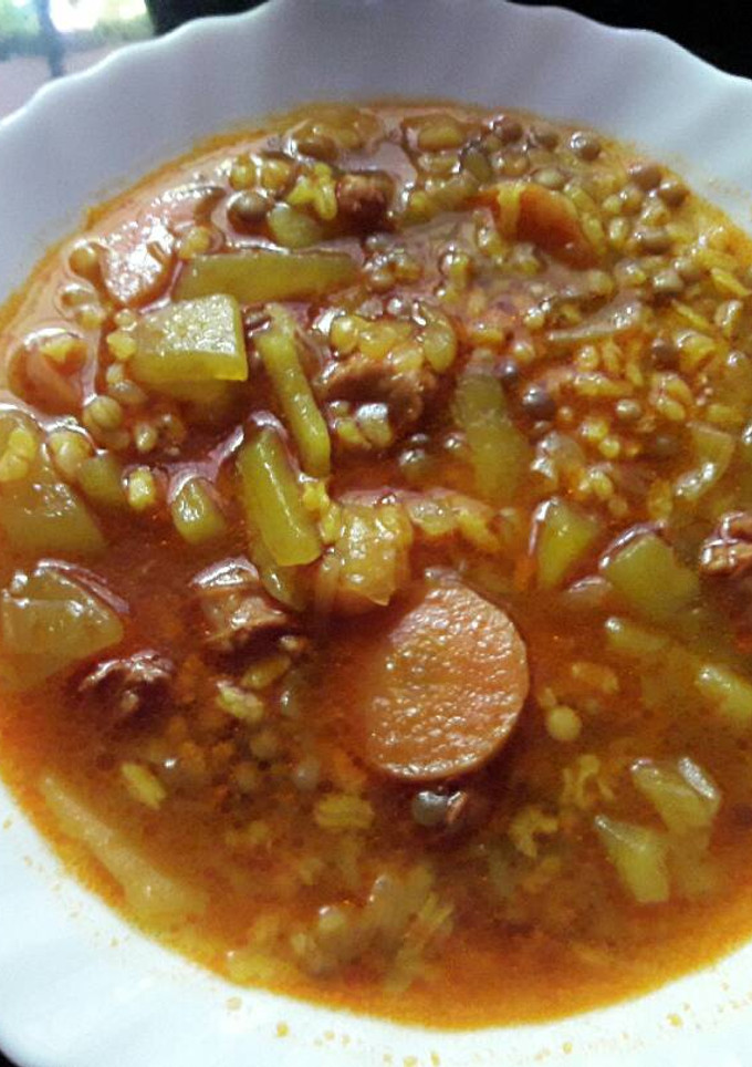 Una foto de Lentejas con arroz y chorizo 🍲🍽